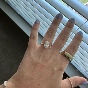 Gold and Silver Solitaire and Band Ring Set